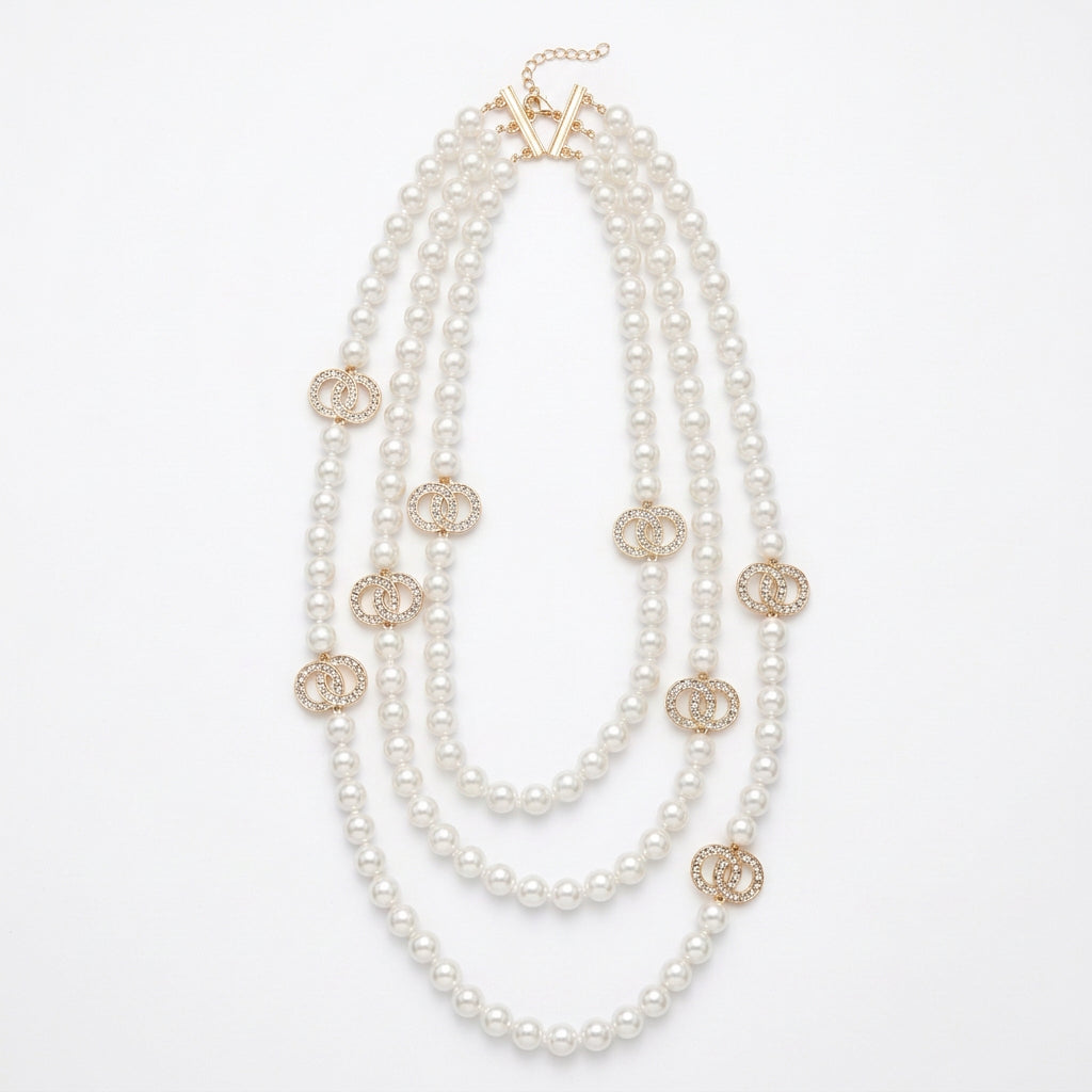 Triple Strand Pearls with Encrusted Double Circles